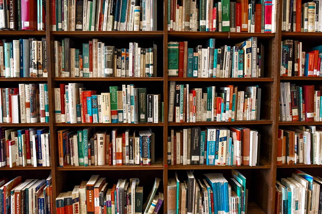 Bookshelf containing many educational books.